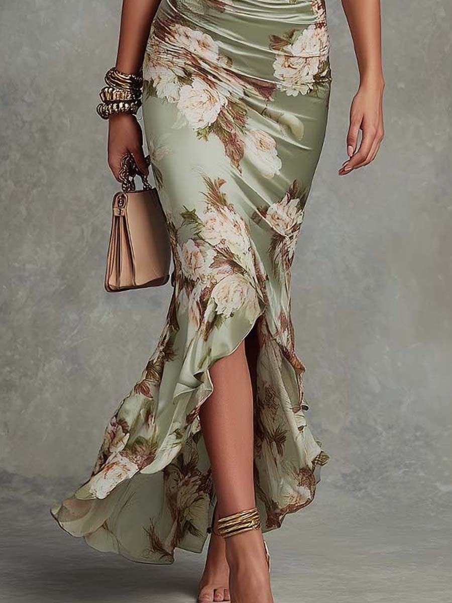 Anna - Robe longue asymétrique verte avec décolleté en V, manches bouffantes évasées et motif floral