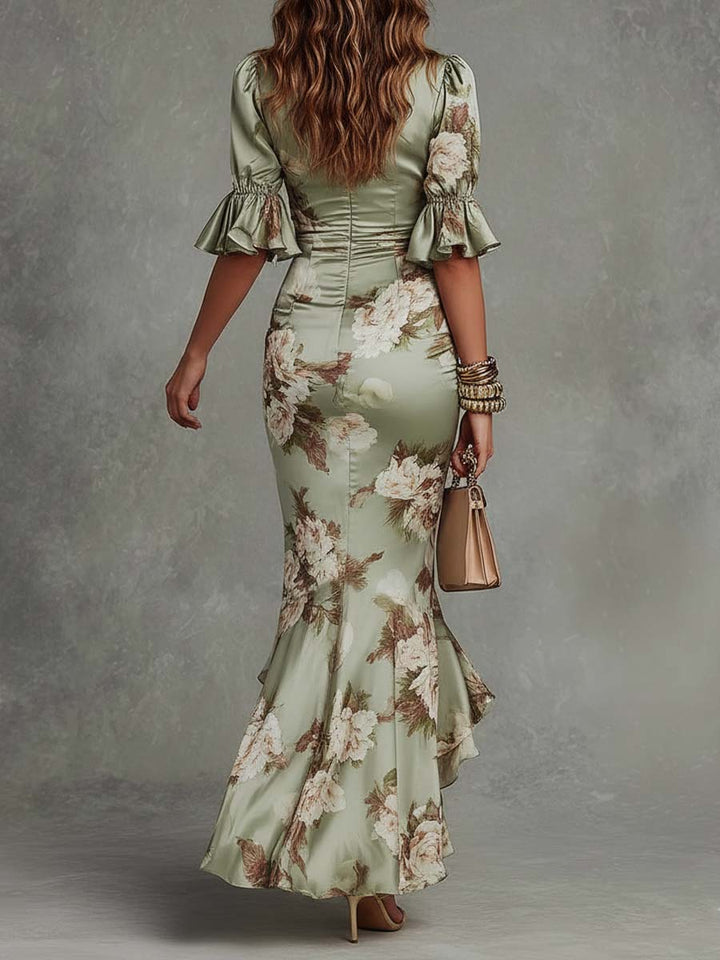 Anna - Robe longue asymétrique verte avec décolleté en V, manches bouffantes évasées et motif floral